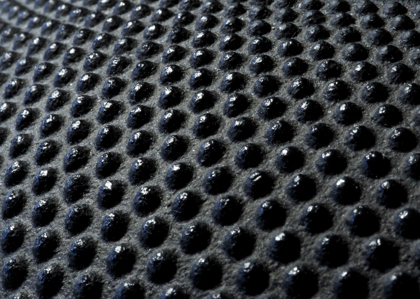 Textura de una moqueta de goma técnica para automóvil